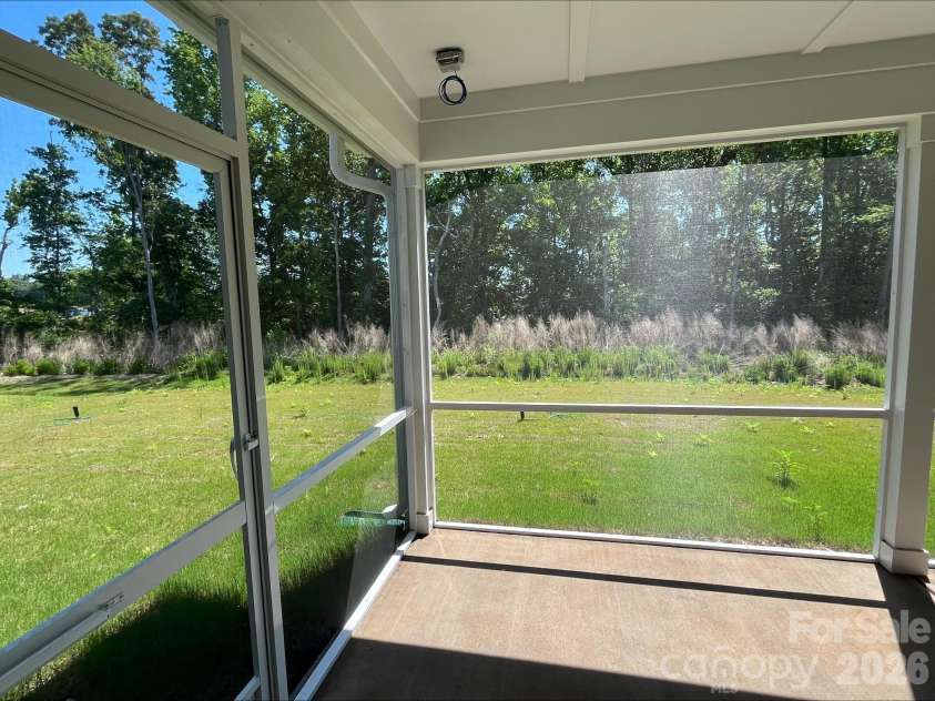 2001 Quiet Woods Road, Monroe, NC 28110.  MLS# CAR4383567, YatesRealty ID 28665. Extended Screened in Patio