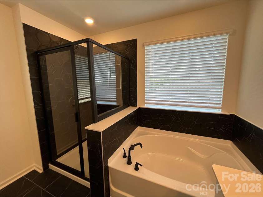 2001 Quiet Woods Road, Monroe, NC 28110.  MLS# CAR4383567, YatesRealty ID 28665. Primary Bathroom