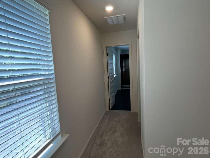2001 Quiet Woods Road, Monroe, NC 28110.  MLS# CAR4383567, YatesRealty ID 28665. Primary Bedroom Hallway