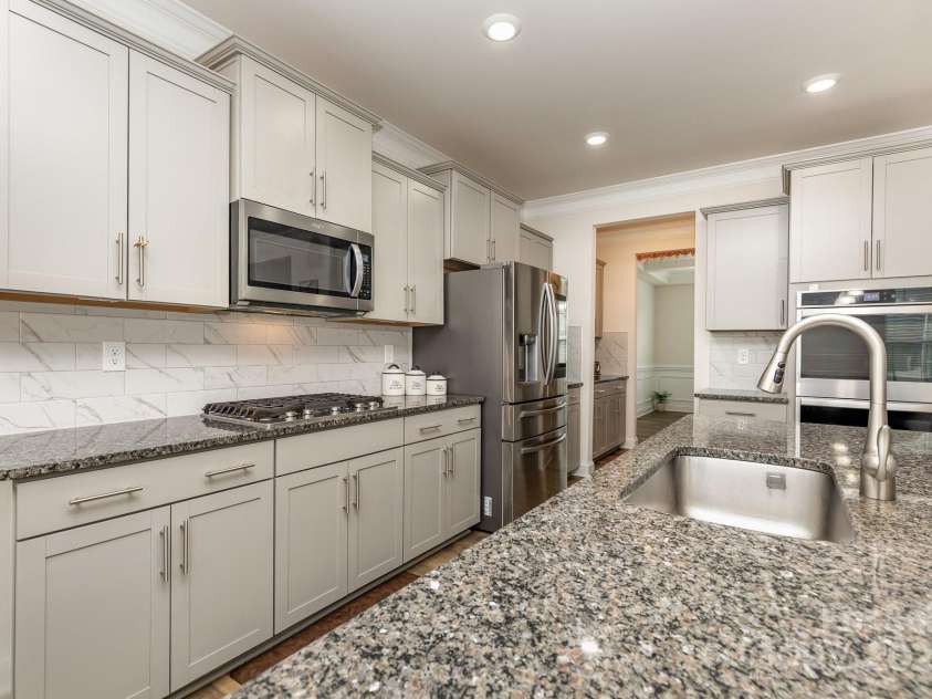 9727 WHITE CHAPEL Drive, Concord, NC 28027.  MLS# CAR4246060, YatesRealty ID 28666. 