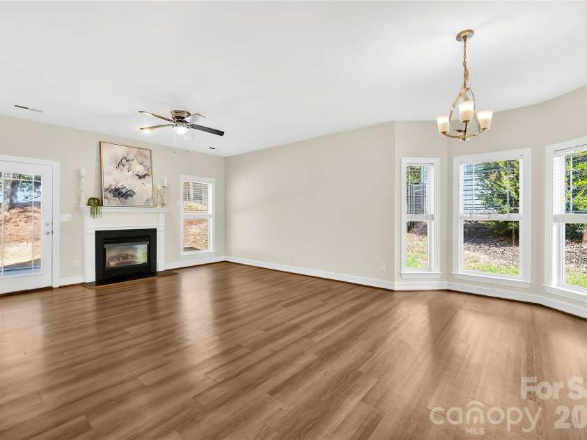 20236 Colony Point Lane, Cornelius, NC 28031.  MLS# CAR4378155, YatesRealty ID 28667. Family Room with Fireplace
