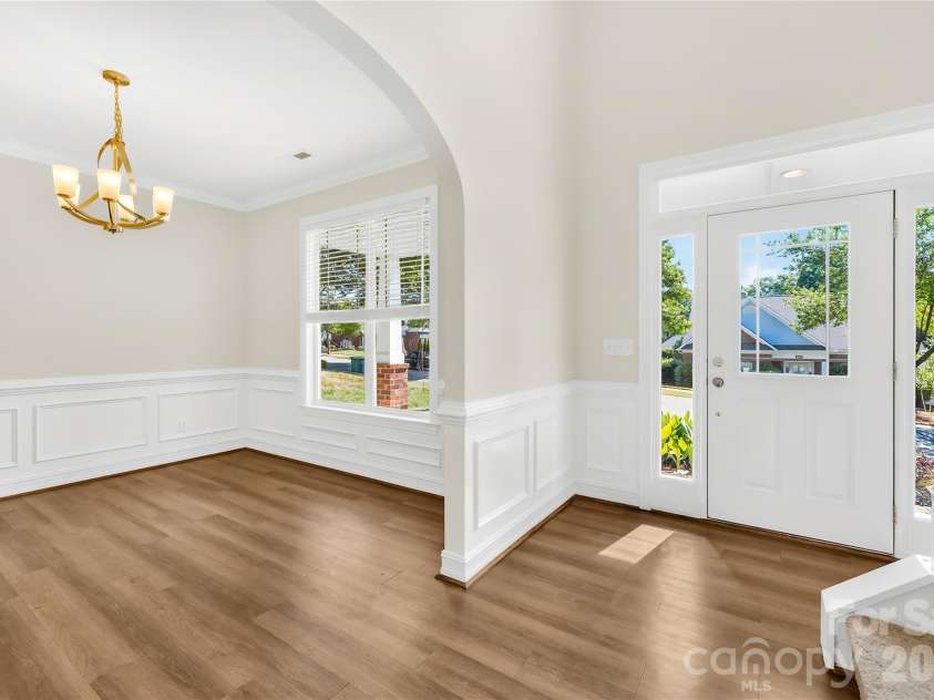 20236 Colony Point Lane, Cornelius, NC 28031.  MLS# CAR4378155, YatesRealty ID 28667. Foyer and Dining room
