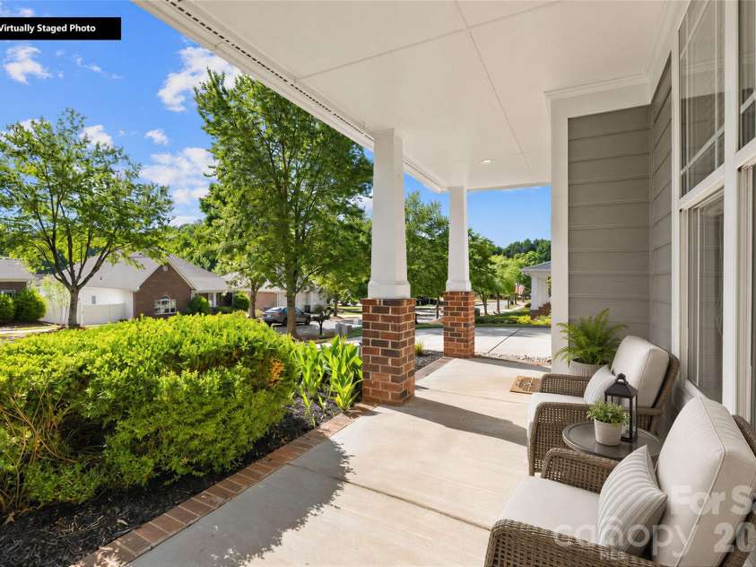 20236 Colony Point Lane, Cornelius, NC 28031.  MLS# CAR4378155, YatesRealty ID 28667. Lovely covered front porch