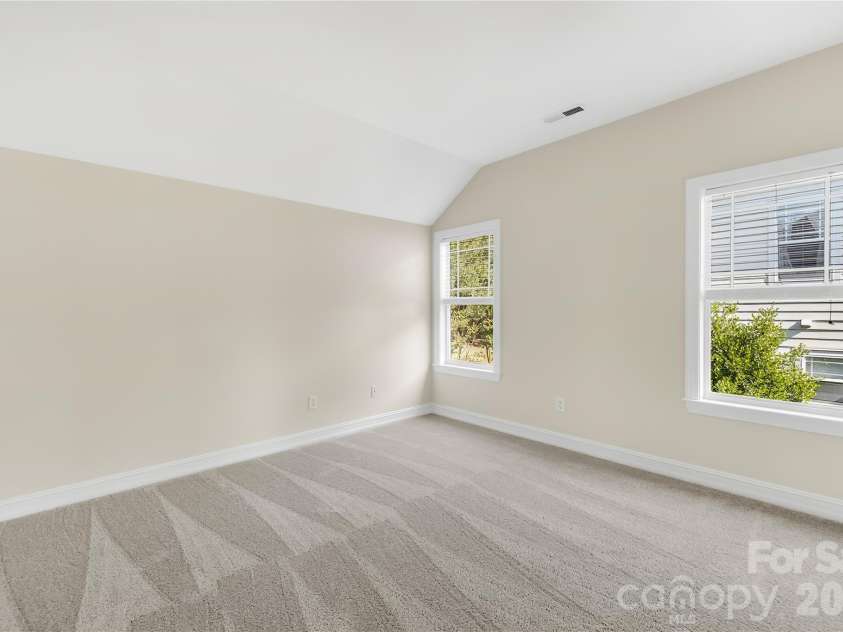 20236 Colony Point Lane, Cornelius, NC 28031.  MLS# CAR4378155, YatesRealty ID 28667. Secondary Bedroom upstairs