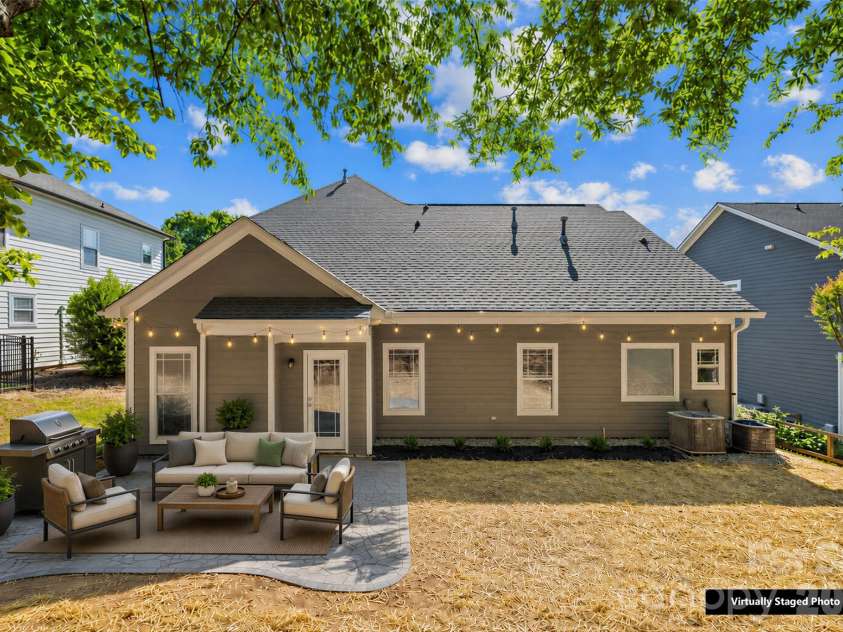 20236 Colony Point Lane, Cornelius, NC 28031.  MLS# CAR4378155, YatesRealty ID 28667. Virtually Staged back yard
