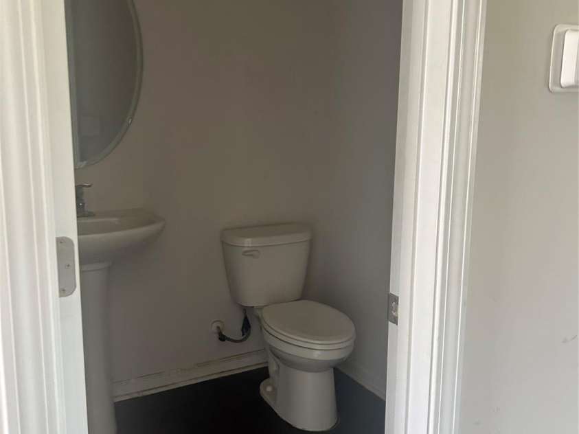 419 Burdock Lane, Arden, NC 28704.  MLS# CAR4259609, YatesRealty ID 28667. Half bath off kitchen/living area