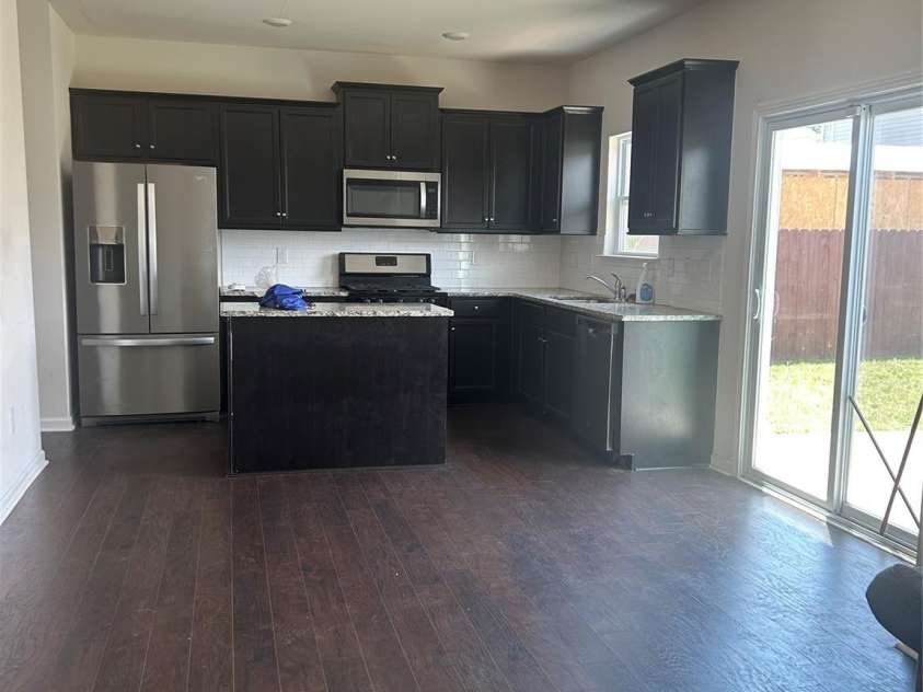 419 Burdock Lane, Arden, NC 28704.  MLS# CAR4259609, YatesRealty ID 28667. Kitchen has stainless steel appliances