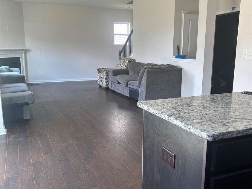 419 Burdock Lane, Arden, NC 28704.  MLS# CAR4259609, YatesRealty ID 28667. Living area with gas fireplace