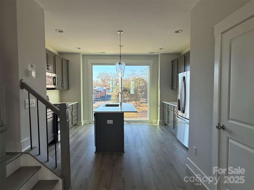 1225 34th Street, Charlotte, NC 28205.  MLS# CAR4211266, YatesRealty ID 28668. Kitchen & Powder