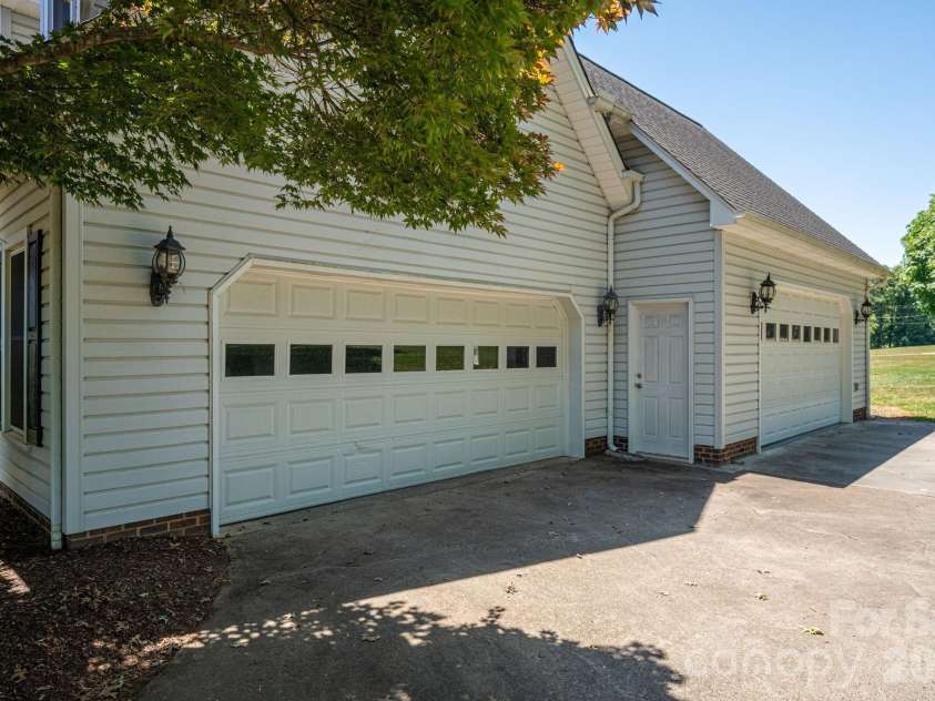 128 Windy Hill Drive, Cherryville, NC 28021.  MLS# CAR4379150, YatesRealty ID 28670. 2 full size garages