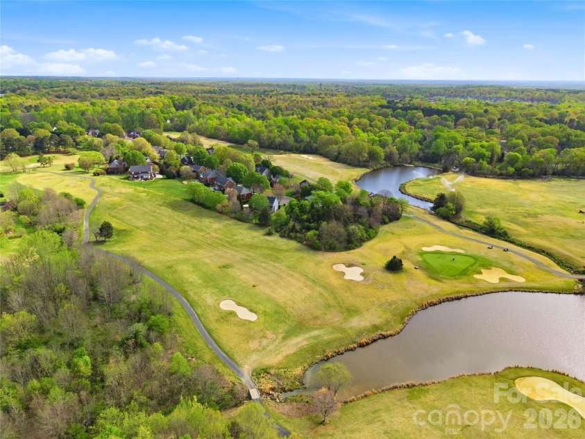 4726 Shannamara Drive, Matthews, NC 28104.  MLS# CAR4383623, YatesRealty ID 28671. Divide Golf Course