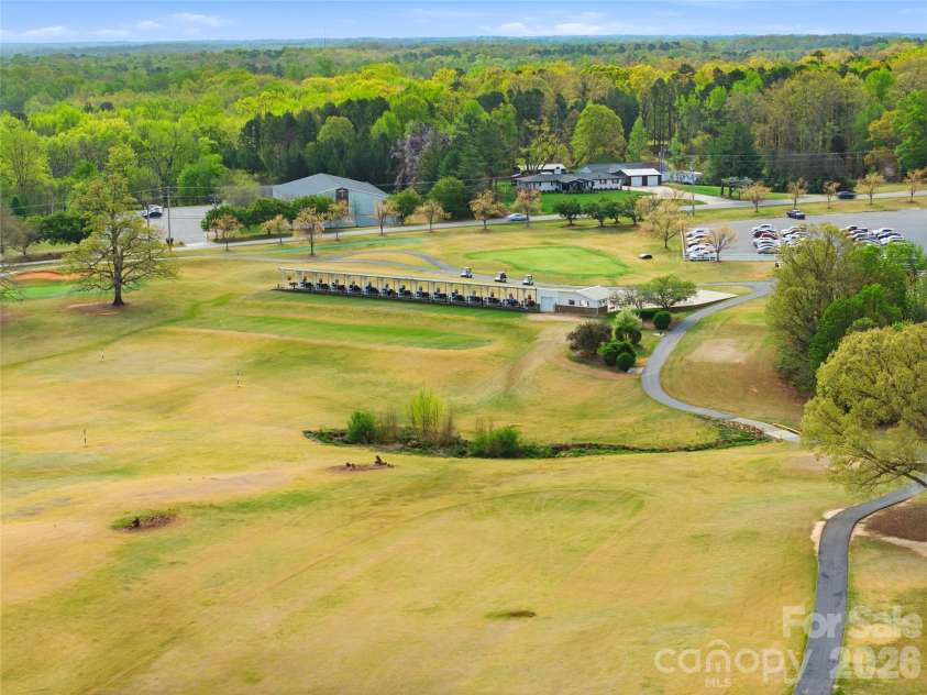4726 Shannamara Drive, Matthews, NC 28104.  MLS# CAR4383623, YatesRealty ID 28671. Divide Golf Course