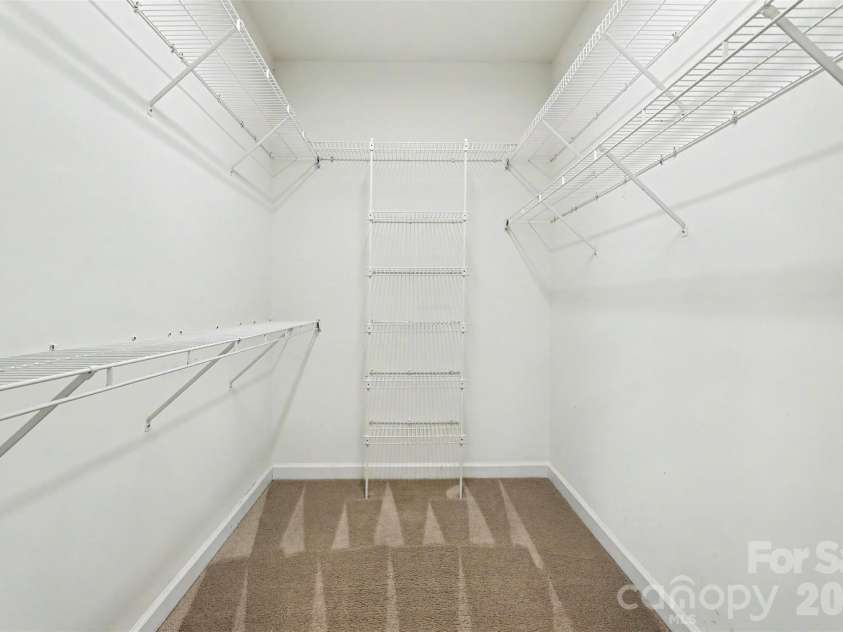 4726 Shannamara Drive, Matthews, NC 28104.  MLS# CAR4383623, YatesRealty ID 28671. Primary closet