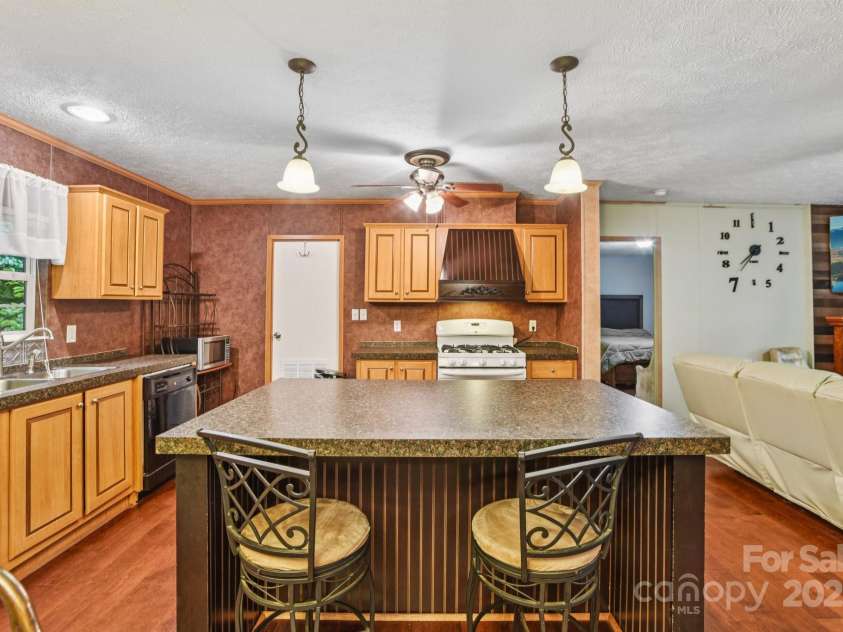 44 Bachelder Lane, Candler, NC 28715.  MLS# CAR4275612, YatesRealty ID 28674. 