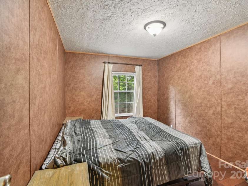 44 Bachelder Lane, Candler, NC 28715.  MLS# CAR4275612, YatesRealty ID 28674. Bedroom 2