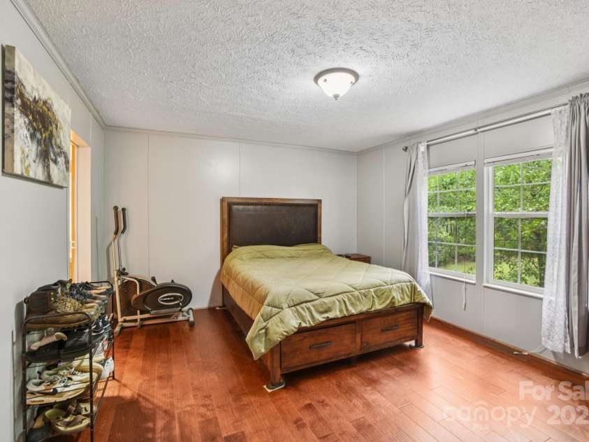 44 Bachelder Lane, Candler, NC 28715.  MLS# CAR4275612, YatesRealty ID 28674. Primary Bedroom