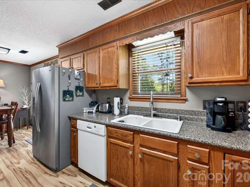 1104 Longmeadow Lane, Monroe, NC 28110.  MLS# CAR4387879, YatesRealty ID 28679. 