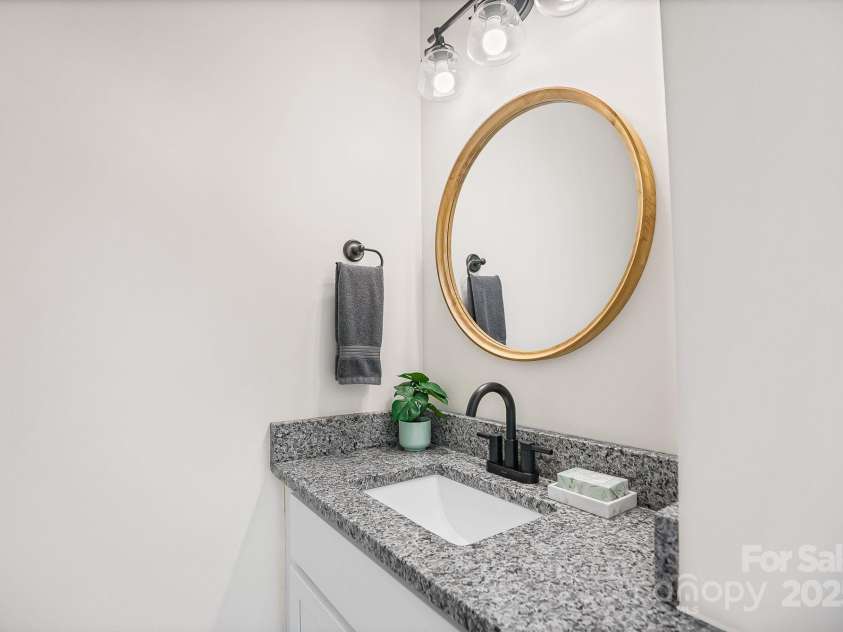 8 Green Tree Lane, Asheville, NC 28805.  MLS# CAR4289236, YatesRealty ID 2868. Half bath on the main floor