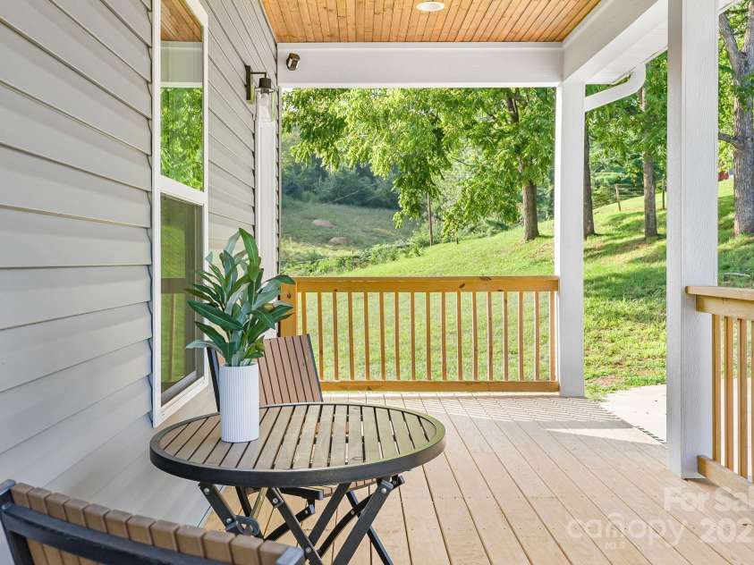 8 Green Tree Lane, Asheville, NC 28805.  MLS# CAR4289236, YatesRealty ID 2868. Inviting covered front porch