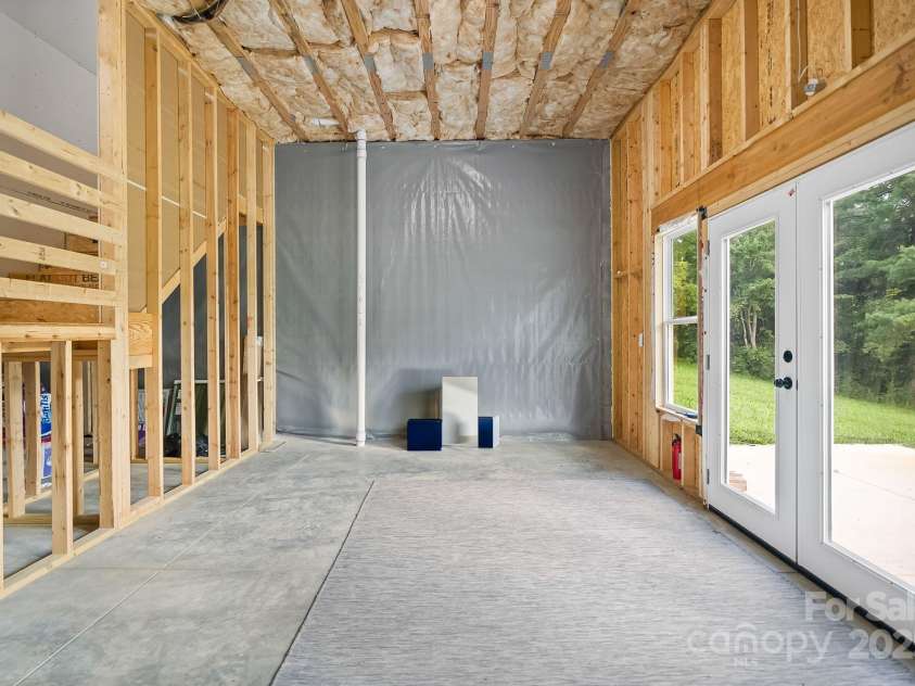 8 Green Tree Lane, Asheville, NC 28805.  MLS# CAR4289236, YatesRealty ID 2868. Walk-out basement with 12' ceilings 
