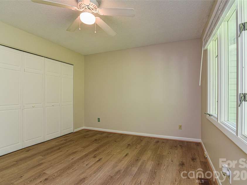 63 Hollybrook Drive, Asheville, NC 28803.  MLS# CAR4383971, YatesRealty ID 28682. 2nd main level bedroom.