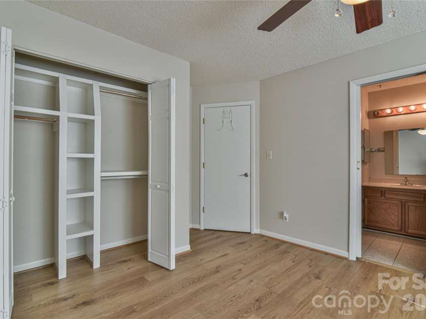 63 Hollybrook Drive, Asheville, NC 28803.  MLS# CAR4383971, YatesRealty ID 28682. Closets with built-in storage.