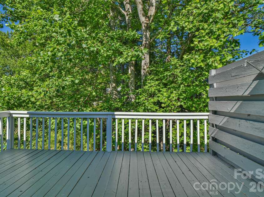 63 Hollybrook Drive, Asheville, NC 28803.  MLS# CAR4383971, YatesRealty ID 28682. Main level deck.