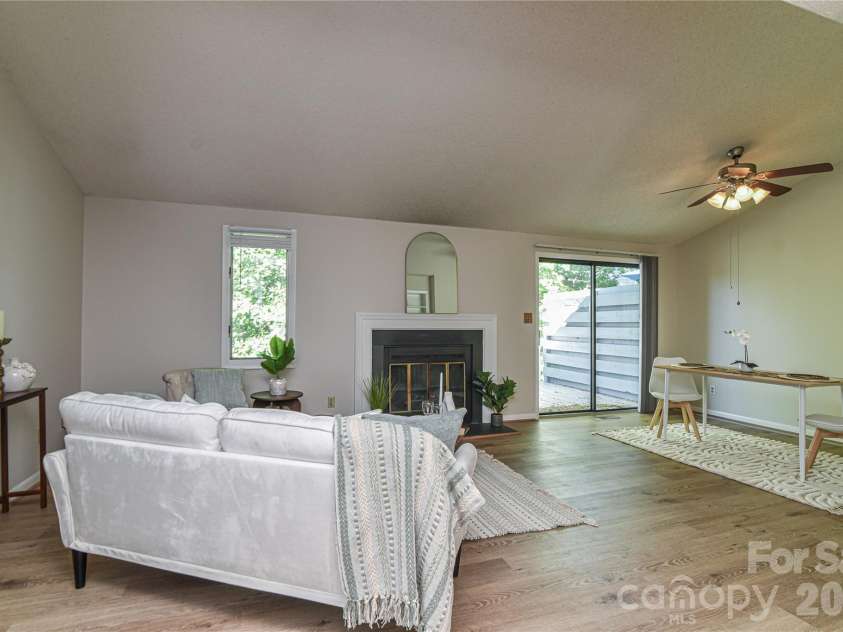 63 Hollybrook Drive, Asheville, NC 28803.  MLS# CAR4383971, YatesRealty ID 28682. Open living and dining space.