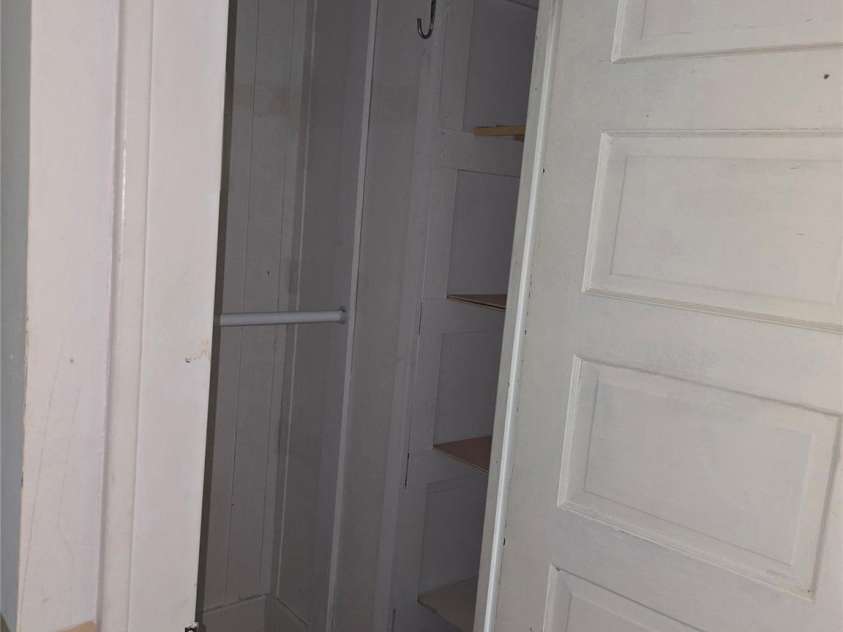 29 Willow Street, Badin, NC 28009.  MLS# CAR4272543, YatesRealty ID 28683. Closet top of stairs