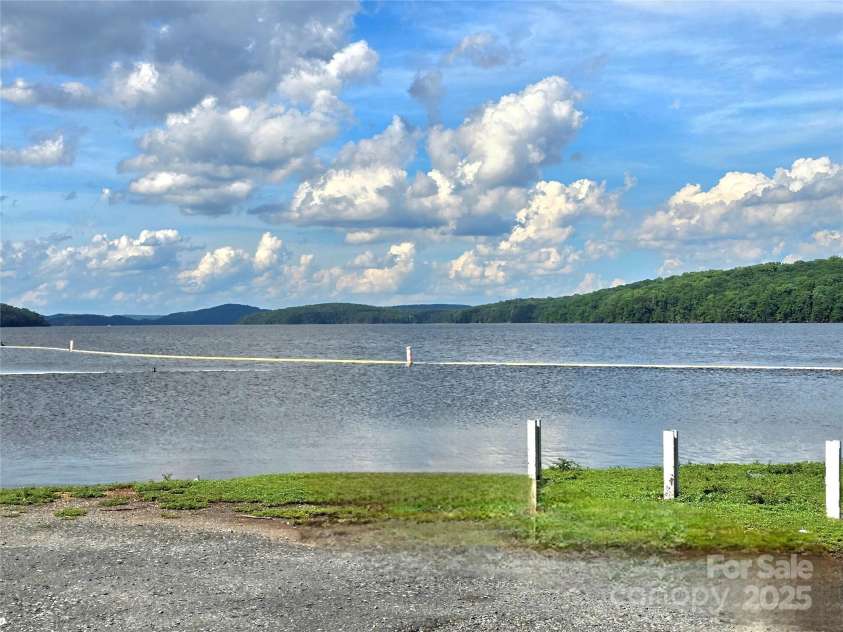 29 Willow Street, Badin, NC 28009.  MLS# CAR4272543, YatesRealty ID 28683. Less than 5 minute drive to Badin lake public swimming, fishing, boating