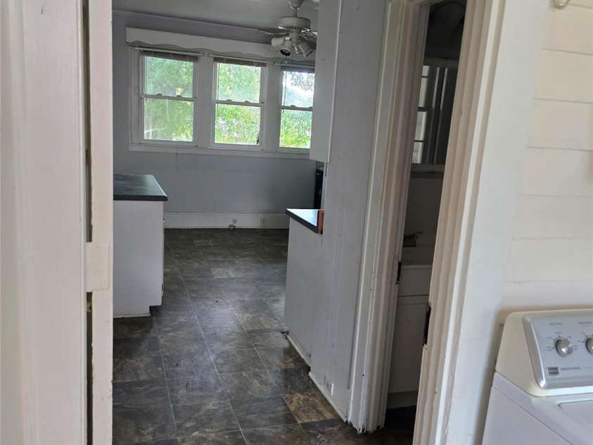 29 Willow Street, Badin, NC 28009.  MLS# CAR4272543, YatesRealty ID 28683. Mudroom/laundry lead into into kitchen