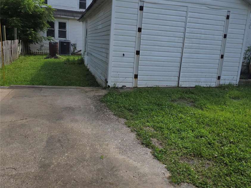 29 Willow Street, Badin, NC 28009.  MLS# CAR4272543, YatesRealty ID 28683. Parking pad around back through alleyway