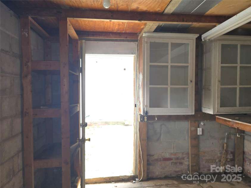 29 Willow Street, Badin, NC 28009.  MLS# CAR4272543, YatesRealty ID 28683. Wired storage building