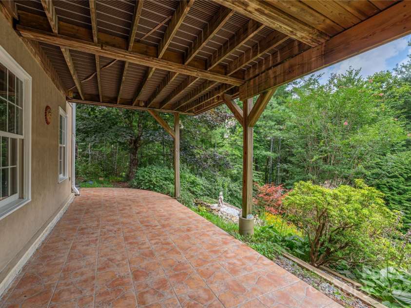 24 Moriah Lane, Asheville, NC 28803.  MLS# CAR4277809, YatesRealty ID 28686. Basement patio