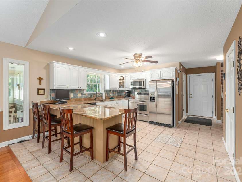 24 Moriah Lane, Asheville, NC 28803.  MLS# CAR4277809, YatesRealty ID 28686. Easy to entertain