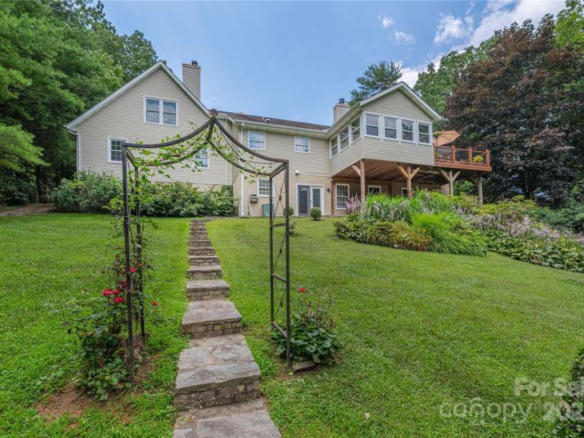 24 Moriah Lane, Asheville, NC 28803.  MLS# CAR4277809, YatesRealty ID 28686. Great yard to explore