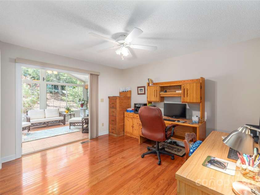 24 Moriah Lane, Asheville, NC 28803.  MLS# CAR4277809, YatesRealty ID 28686. Main level office or additional bedroom