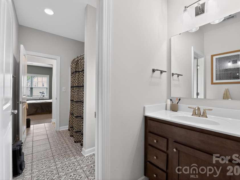 8529 Raven Top Drive, Mint Hill, NC 28227.  MLS# CAR4390463, YatesRealty ID 28692. Bathroom upper