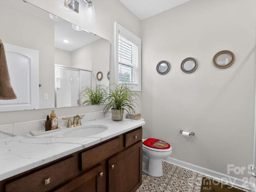 8529 Raven Top Drive, Mint Hill, NC 28227.  MLS# CAR4390463, YatesRealty ID 28692. Full bathroom on main