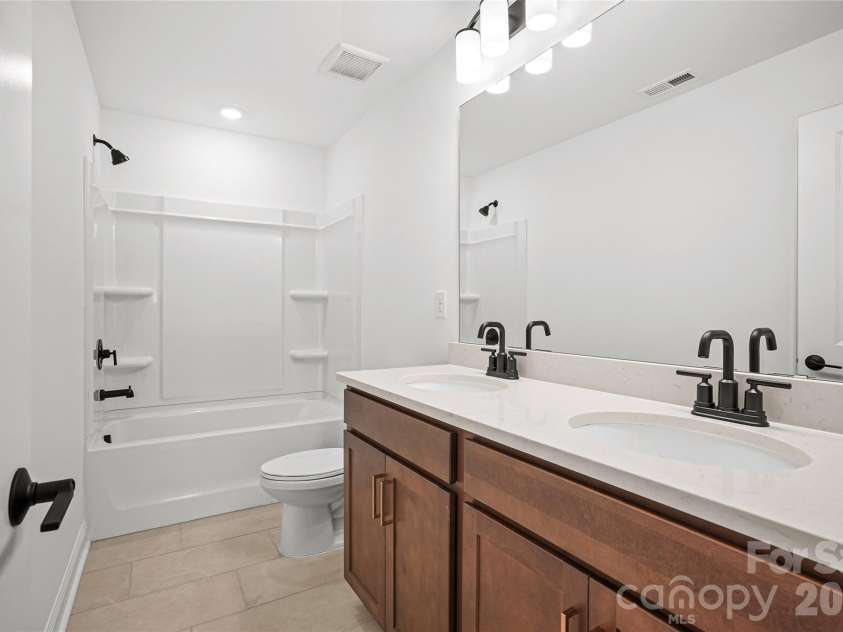 1210 Chasity Trails Court, Matthews, NC 28104.  MLS# CAR4387944, YatesRealty ID 28693. Bath