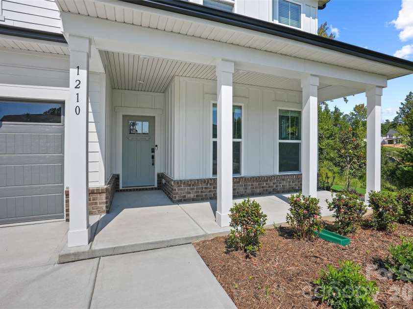 1210 Chasity Trails Court, Matthews, NC 28104.  MLS# CAR4387944, YatesRealty ID 28693. Front porch
