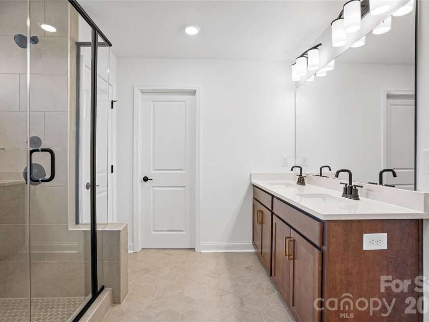 1210 Chasity Trails Court, Matthews, NC 28104.  MLS# CAR4387944, YatesRealty ID 28693. Primary bathroom