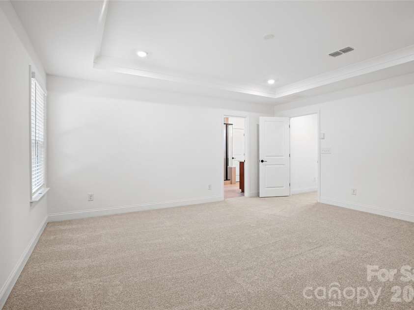 1210 Chasity Trails Court, Matthews, NC 28104.  MLS# CAR4387944, YatesRealty ID 28693. Primary bedroom