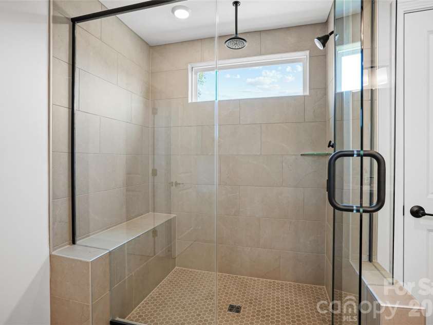 1210 Chasity Trails Court, Matthews, NC 28104.  MLS# CAR4387944, YatesRealty ID 28693. Primary shower