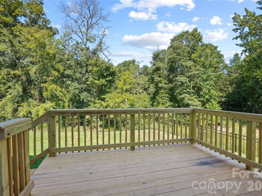 1210 Chasity Trails Court, Matthews, NC 28104.  MLS# CAR4387944, YatesRealty ID 28693. Rear Deck