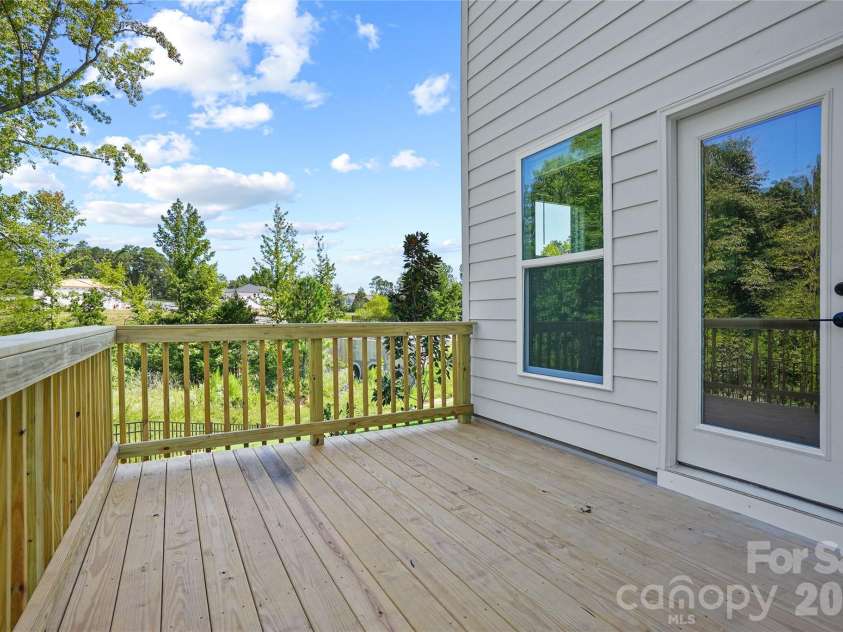 1210 Chasity Trails Court, Matthews, NC 28104.  MLS# CAR4387944, YatesRealty ID 28693. Rear Deck