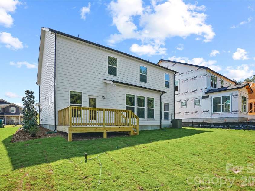 1210 Chasity Trails Court, Matthews, NC 28104.  MLS# CAR4387944, YatesRealty ID 28693. Rear Exterior