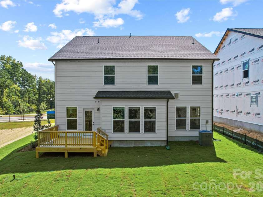 1210 Chasity Trails Court, Matthews, NC 28104.  MLS# CAR4387944, YatesRealty ID 28693. Rear Exterior