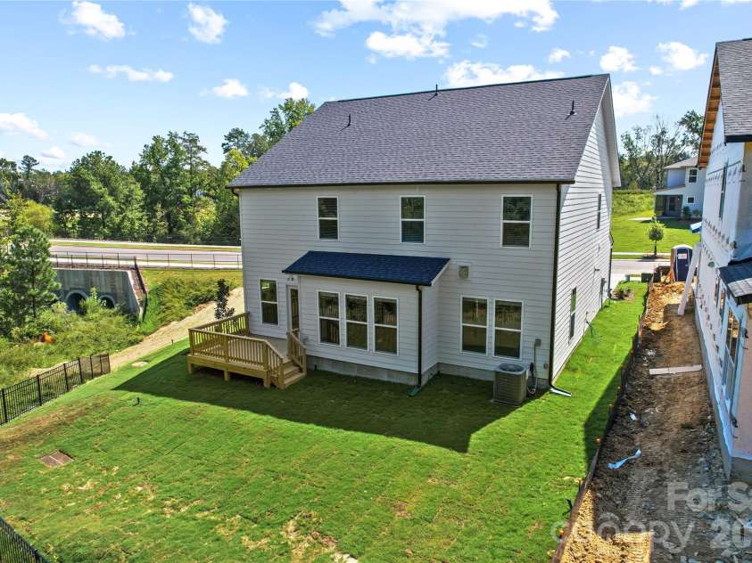 1210 Chasity Trails Court, Matthews, NC 28104.  MLS# CAR4387944, YatesRealty ID 28693. Rear Exterior