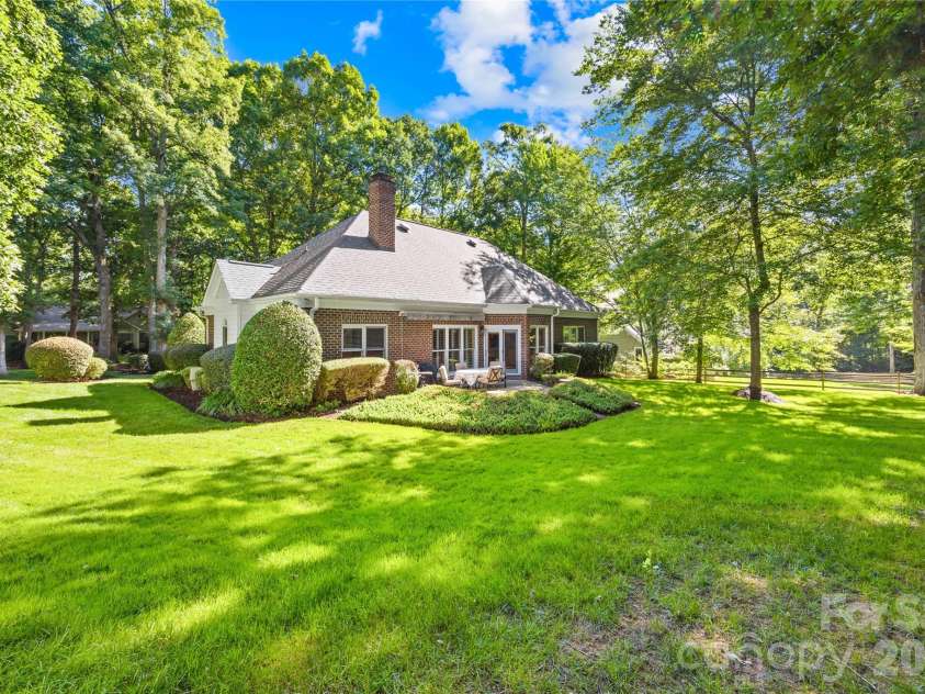 138 Woodstream Circle, Mooresville, NC 28117.  MLS# CAR4384438, YatesRealty ID 28694. Large back yard